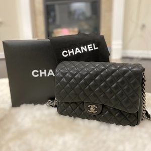 Authentic CHANEL Black Quilted Caviar Leather Rock in Rome Flap Bag